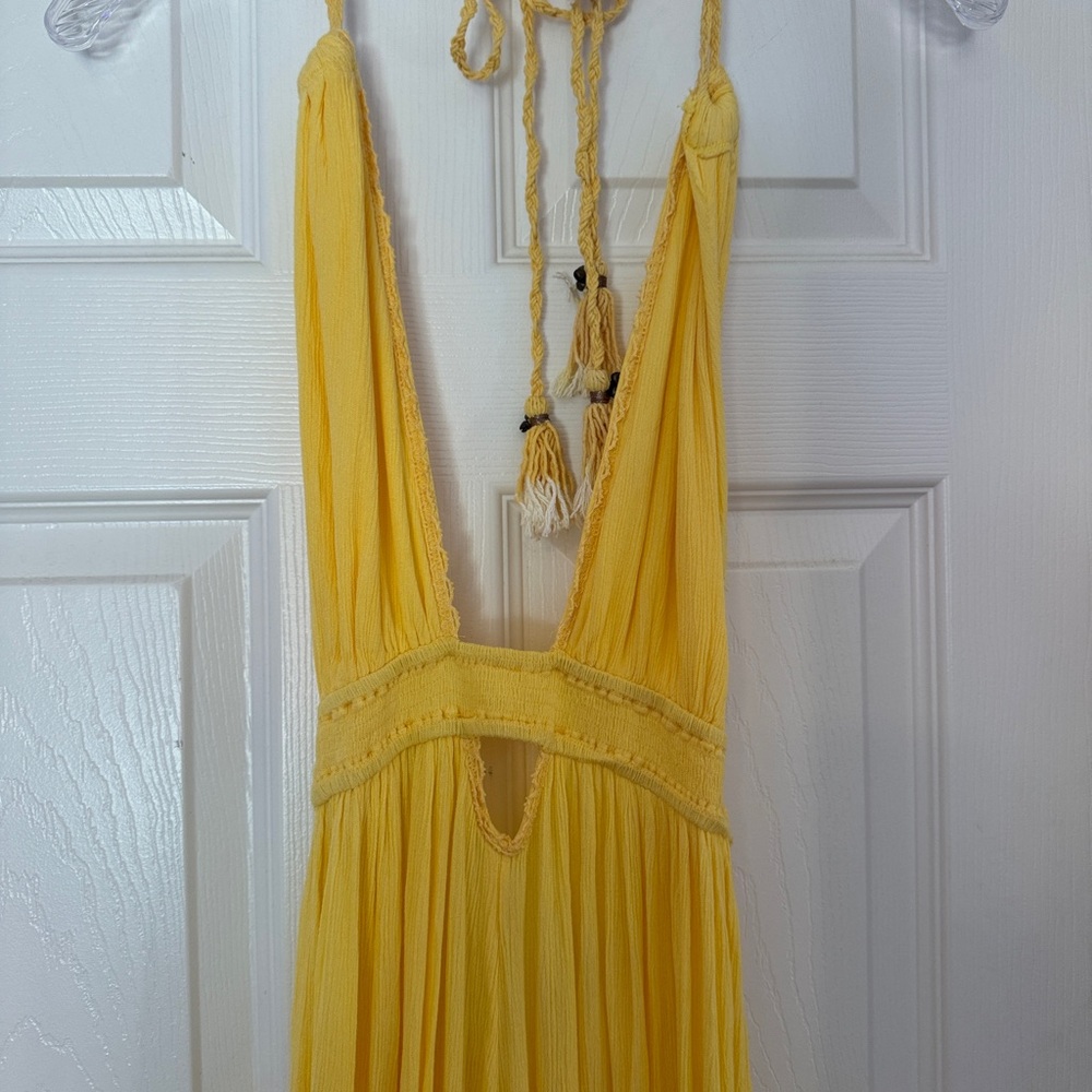 Bran new free people maxi dress, never worn, size small.